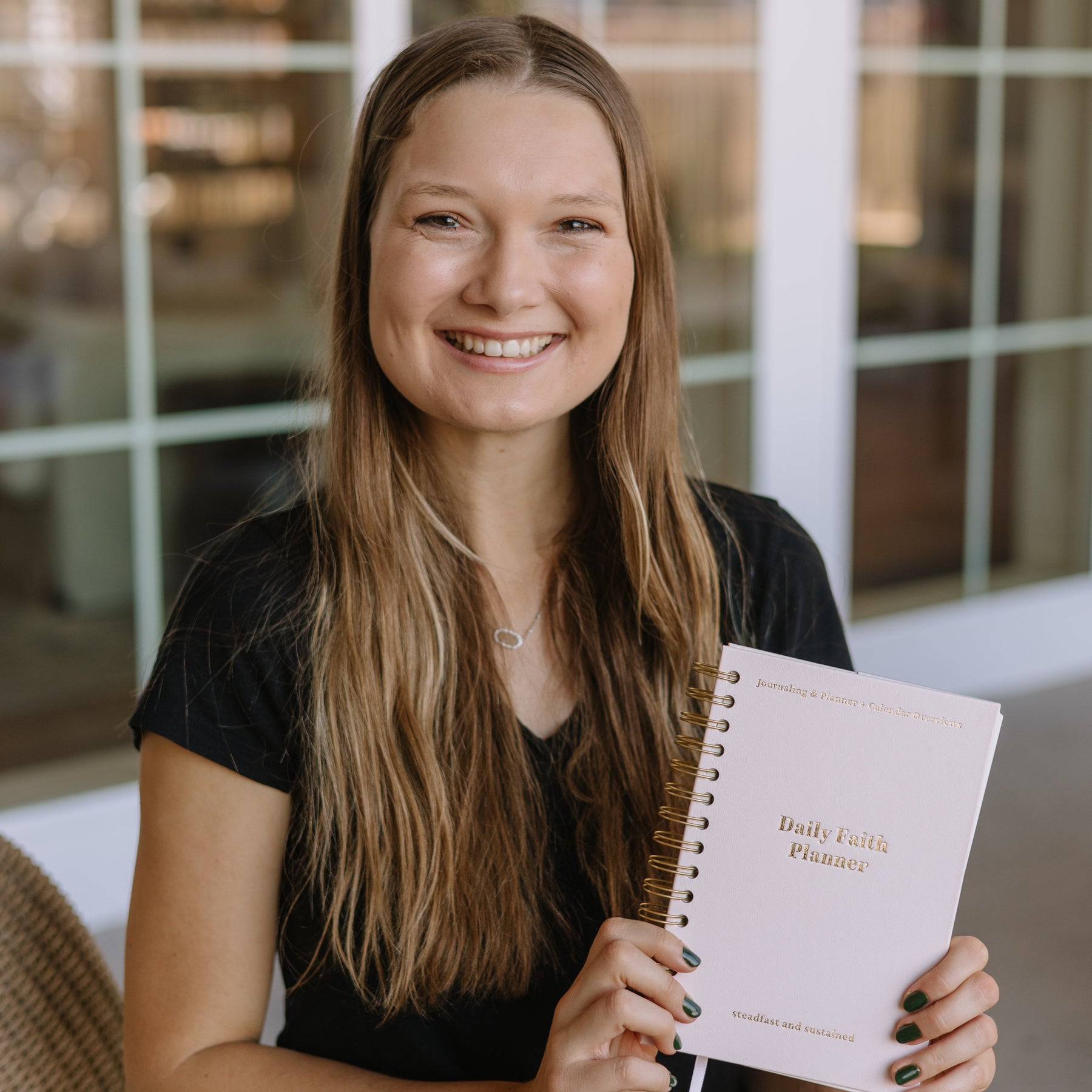 Daily planner with space to plan, reflect, and pray — faith-based planner for women