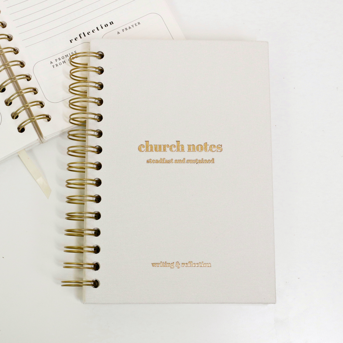 White spiral Church Notes Journal included in the trio