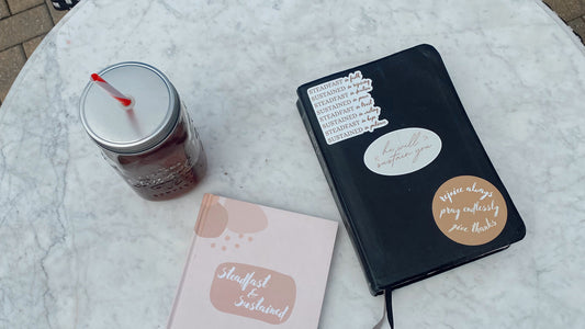 Steadfast and Sustained journal and Bible with coffee for daily devotion