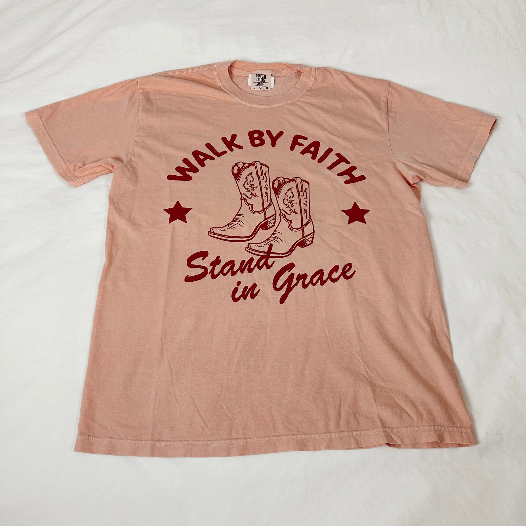Christian women's t-shirt featuring Walk by Faith, Stand in Grace