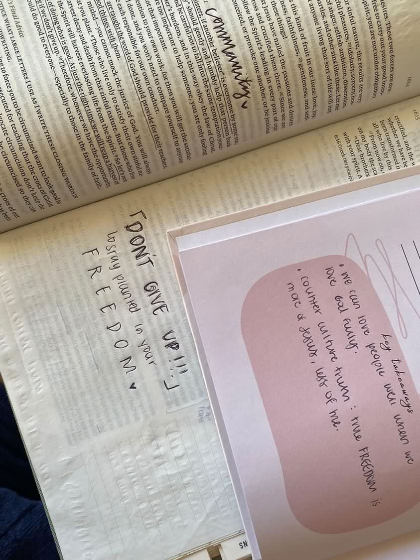 Bible and journal with handwritten notes and reflections, showing personal Scripture study and faith journaling